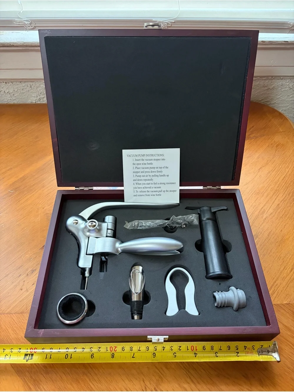 Brookstone Heritage Connoisseur's Wine Opener set housed in a wooden presentati